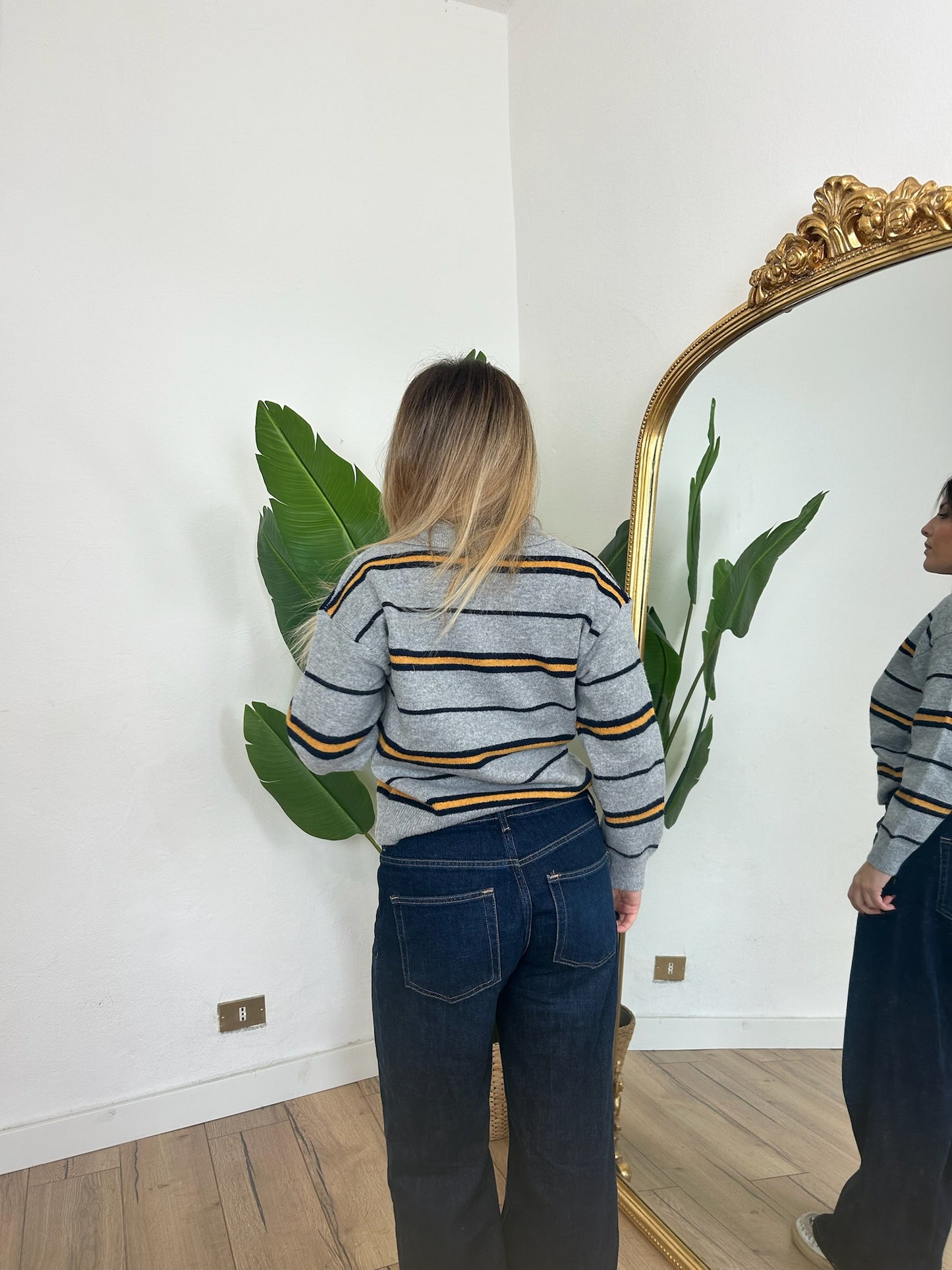 Maglia polo a righe grigia