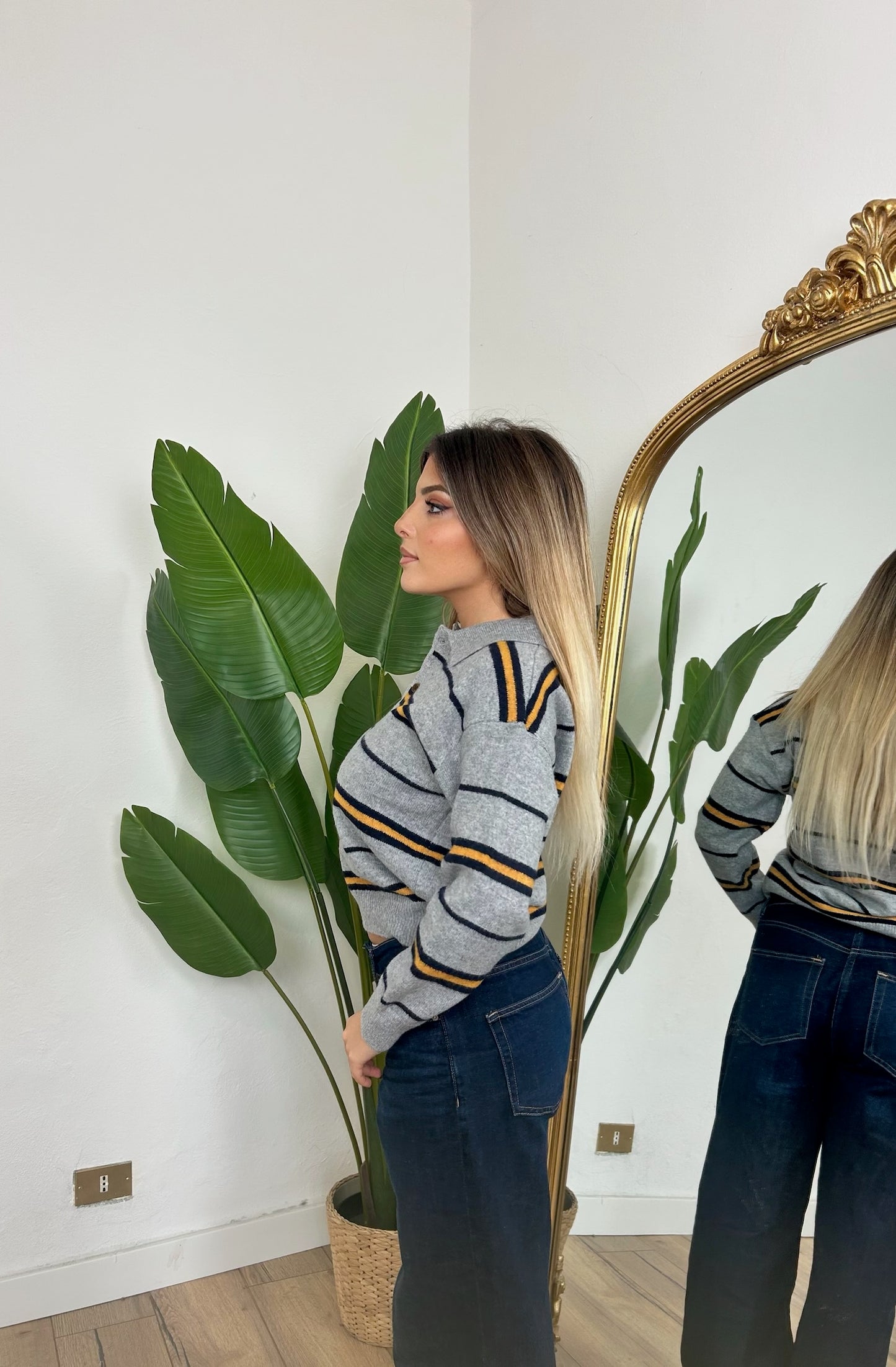 Maglia polo a righe grigia