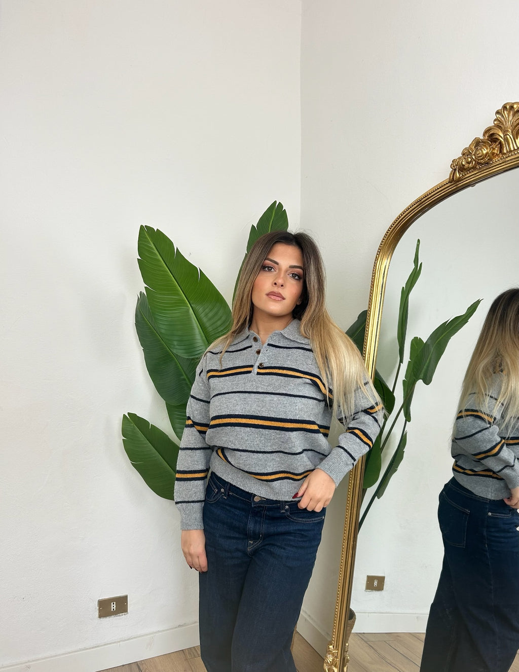 Maglia polo a righe grigia