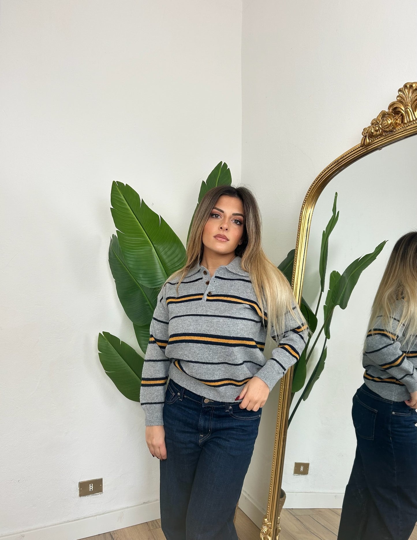 Maglia polo a righe grigia